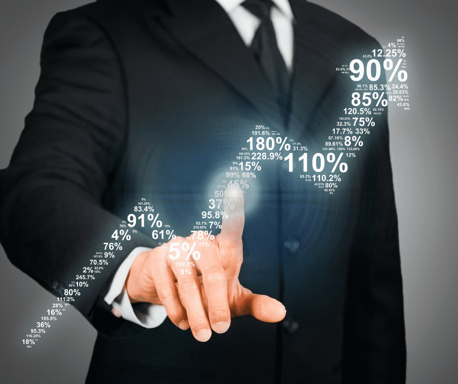Image showing business man pointing to graph of improved cashflow.